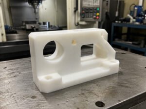 White nylon CNC machined plastic bracket with holes and custom structure
